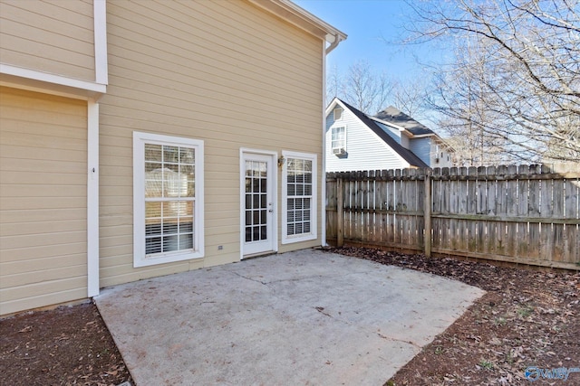 view of patio / terrace featuring fence