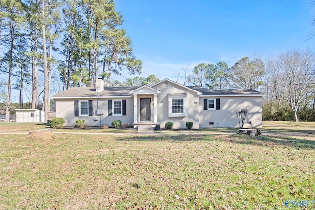 ranch-style house featuring a front lawn