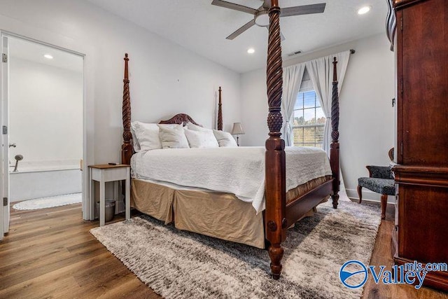 bedroom featuring hardwood / wood-style floors and ceiling fan