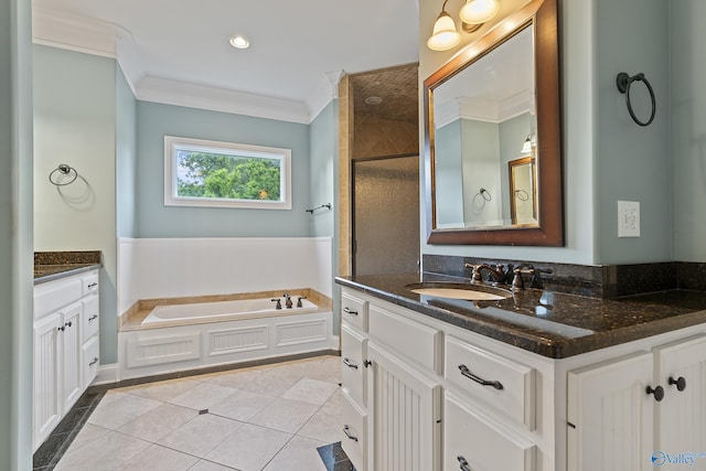 119 Railway Ln SE, Huntsville, AL 35803 - full bathroom with crown molding, tile patterned floors, vanity, a garden tub, and a shower