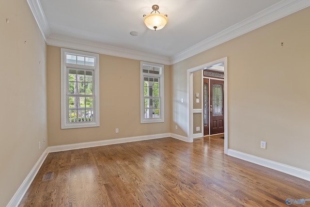 119 Railway Ln SE, Huntsville, AL 35803 - spare room with crown molding, wood finished floors, and baseboards