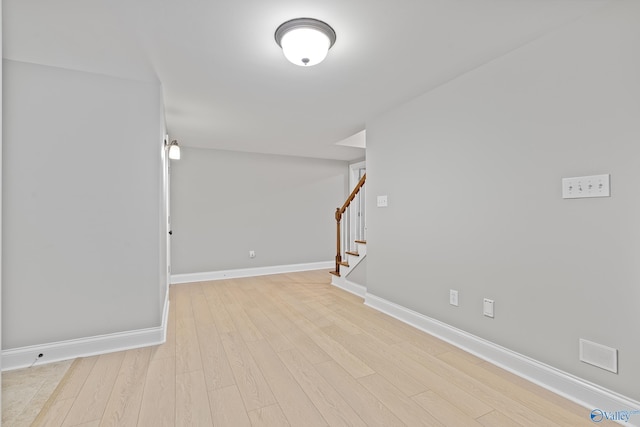 119 Railway Ln SE, Huntsville, AL 35803 - spare room with wood finished floors, baseboards, and stairway