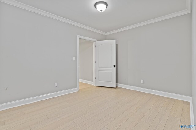 119 Railway Ln SE, Huntsville, AL 35803 - empty room with ornamental molding, baseboards, and light wood-style flooring