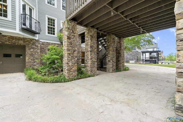 119 Railway Ln SE, Huntsville, AL 35803 - view of patio with a garage
