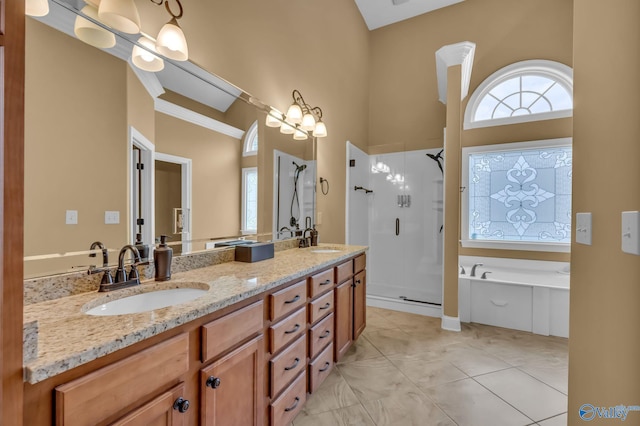 1006 Split Rock Cv, Huntsville, AL 35806 - full bath with a sink, double vanity, a shower stall, and a garden tub
