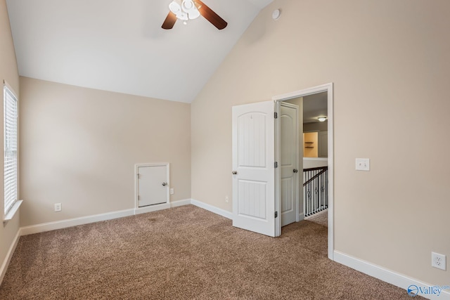 additional living space with a ceiling fan, baseboards, a healthy amount of sunlight, and carpet