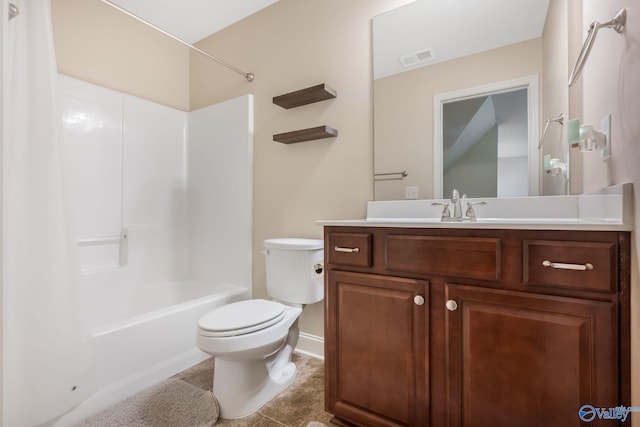 full bathroom with vanity, toilet, baseboards, shower / washtub combination, and visible vents