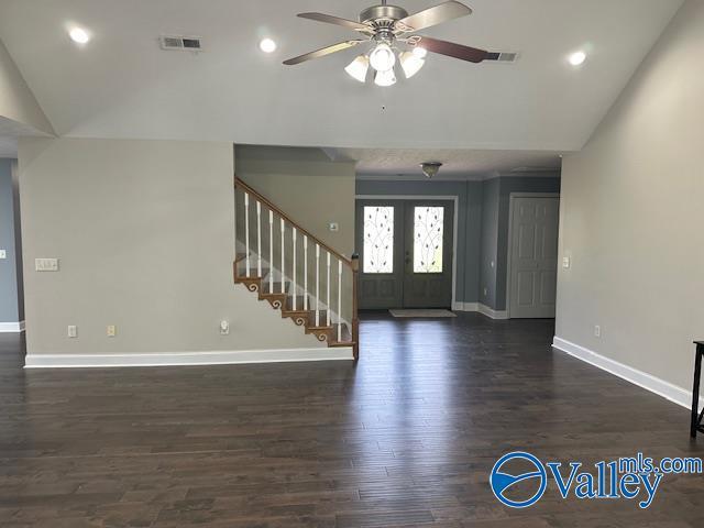 foyer entrance with stairs, french doors, dark wood-style flooring, and baseboards