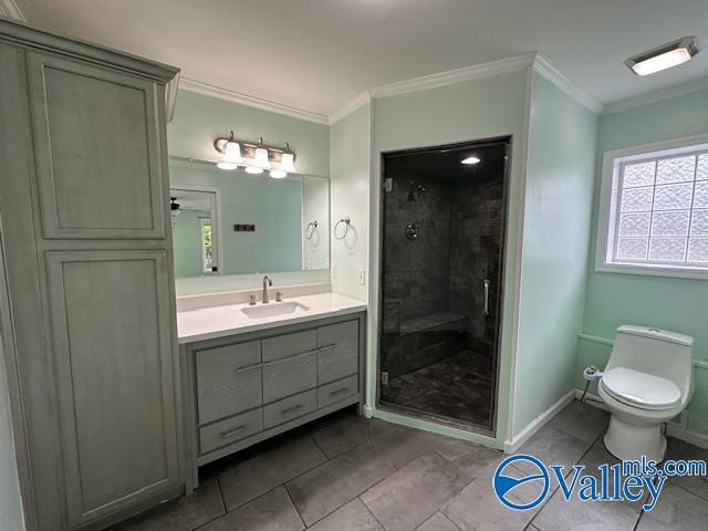 full bath with toilet, vanity, ornamental molding, and a stall shower