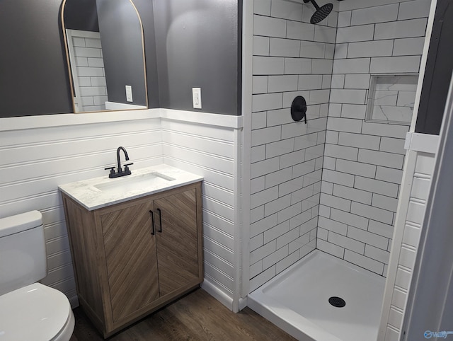 2537 Rexford St, Gadsden, AL 35903 - bathroom featuring a stall shower, vanity, wood finished floors, and a wainscoted wall