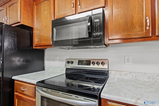 kitchen featuring black appliances