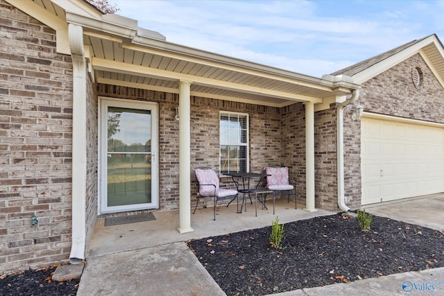 doorway to property featuring a garage