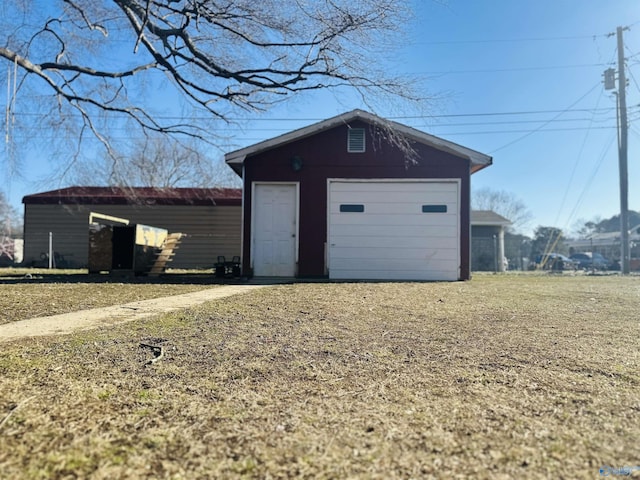 view of outbuilding featuring a garage