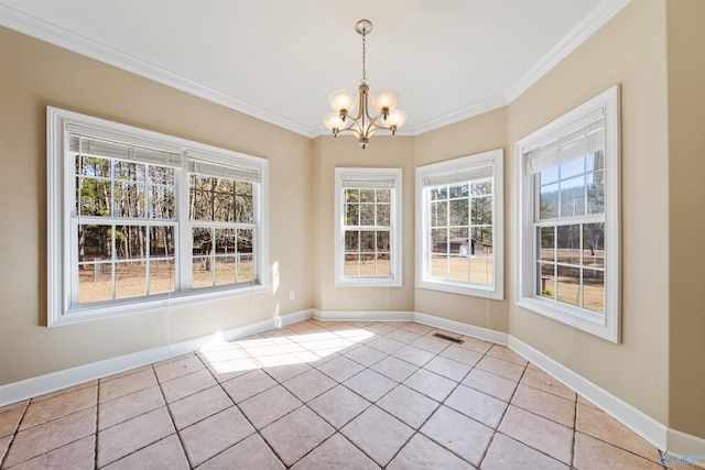 unfurnished dining area featuring crown molding, light tile patterned floors, and a chandelier