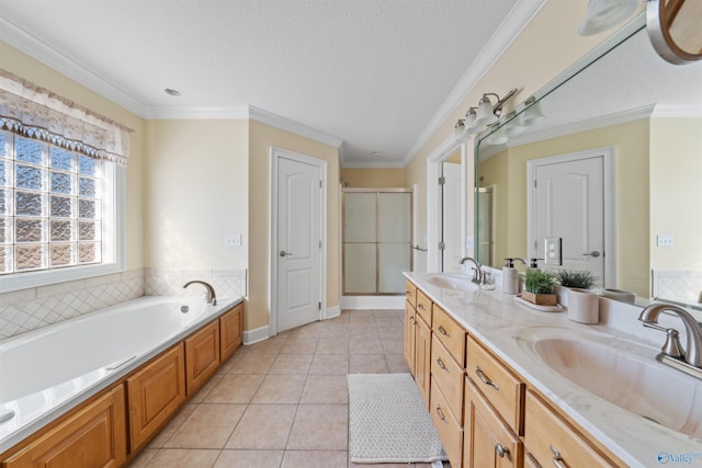 bathroom with tile patterned flooring, vanity, ornamental molding, and independent shower and bath