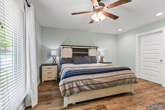 bedroom featuring a ceiling fan, recessed lighting, and wood finished floors