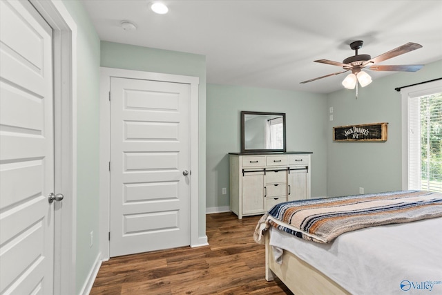 bedroom featuring recessed lighting, baseboards, ceiling fan, and dark wood finished floors