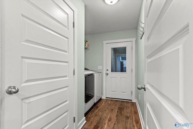interior space with separate washer and dryer, laundry area, and dark wood-style floors