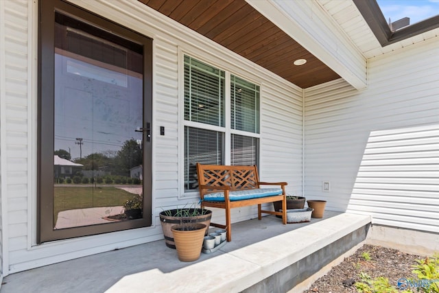 doorway to property with a porch
