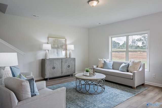 418 Tracer St, Huntsville, AL 35811 - living area with wood finished floors and baseboards