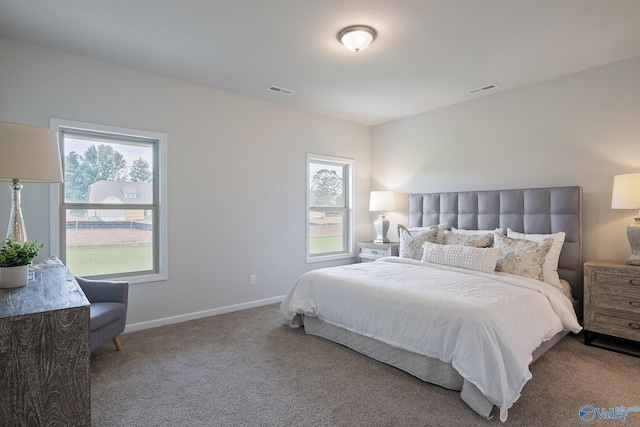 418 Tracer St, Huntsville, AL 35811 - carpeted bedroom featuring baseboards