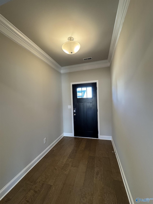 entryway featuring crown molding and dark hardwood / wood-style floors