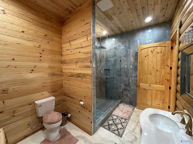 bathroom with a shower with shower door, wooden ceiling, toilet, and wood walls