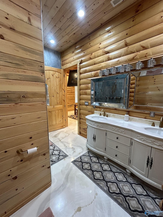 bathroom with vanity, wooden ceiling, log walls, and wood walls