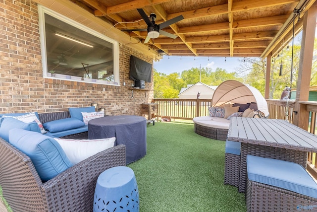 view of patio / terrace with a ceiling fan and an outdoor hangout area