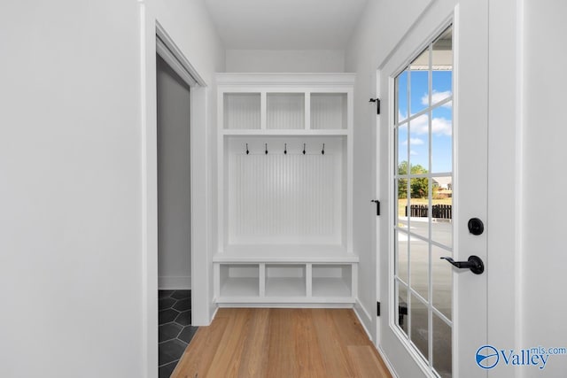 mudroom with wood-type flooring