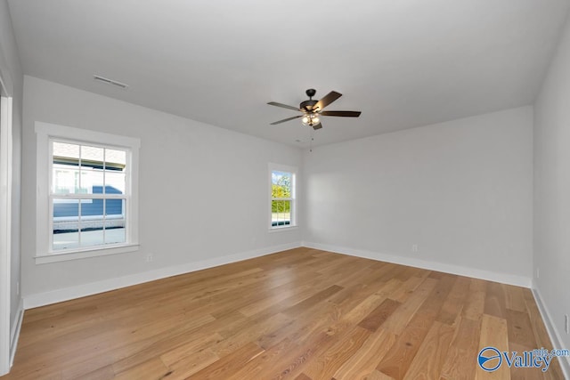 unfurnished room featuring light hardwood / wood-style floors and ceiling fan