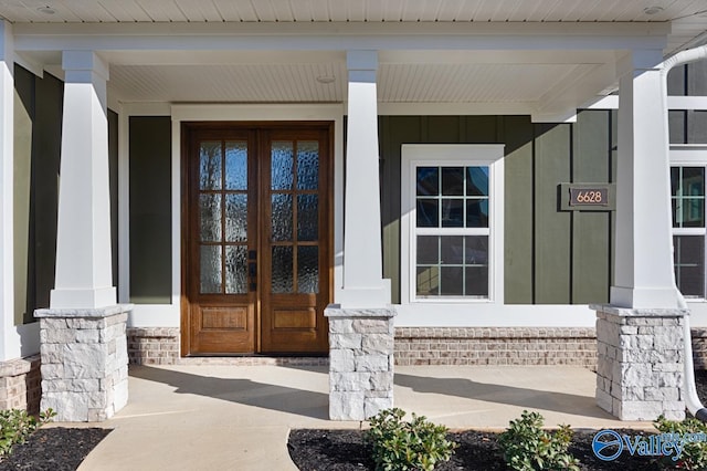 entrance to property featuring french doors