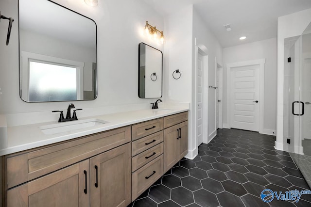 bathroom featuring vanity and walk in shower