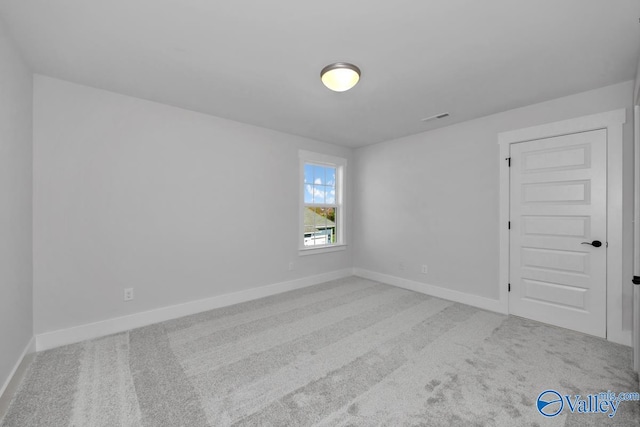 empty room with carpet floors