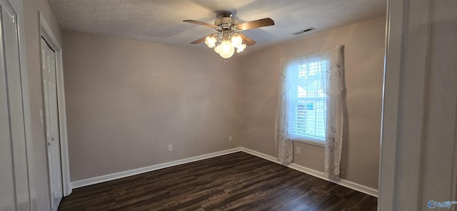 113 Sycamore Pl, Athens, AL 35611 - unfurnished bedroom featuring dark wood finished floors, baseboards, and ceiling fan