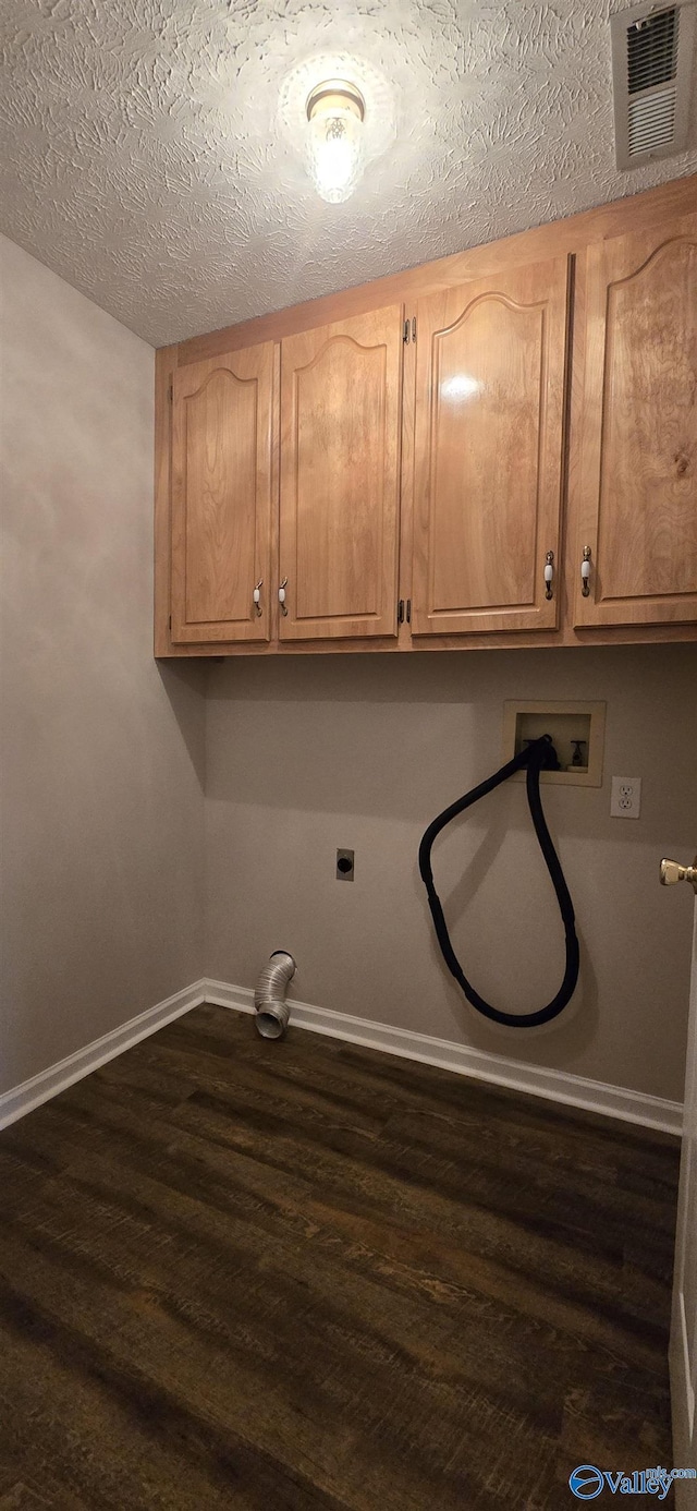 113 Sycamore Pl, Athens, AL 35611 - washroom with cabinet space, hookup for a washing machine, dark wood-style flooring, baseboards, and a textured ceiling