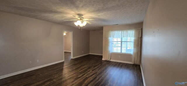 113 Sycamore Pl, Athens, AL 35611 - spare room featuring dark wood-style flooring, a ceiling fan, baseboards, and a textured ceiling