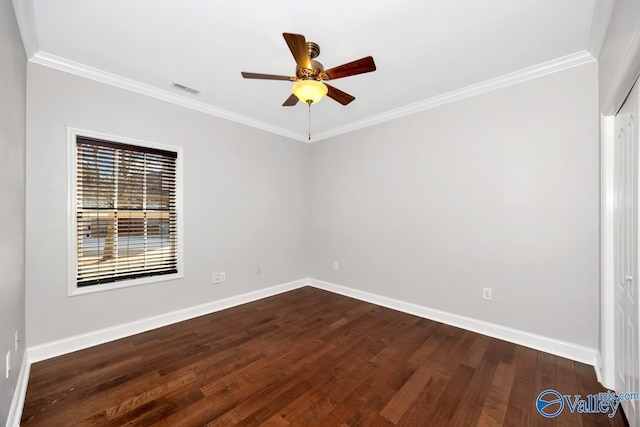 empty room featuring visible vents, baseboards, ceiling fan, ornamental molding, and dark wood-style flooring