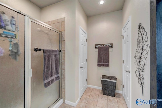 990 Chambers Rd, Double Springs, AL 35553 - full bathroom featuring a stall shower, tile patterned flooring, and baseboards