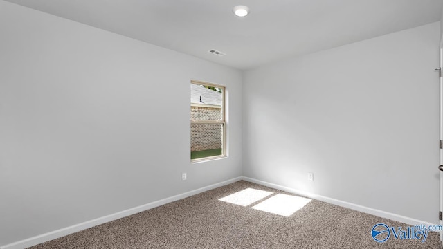 view of carpeted spare room