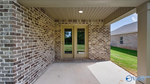 doorway to property with a patio