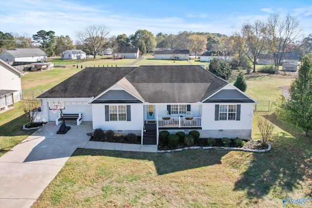 single story home with covered porch and a front yard