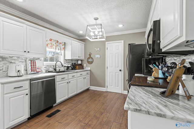 kitchen featuring dark wood-type flooring, white cabinets, crown molding, hanging light fixtures, and stainless steel appliances