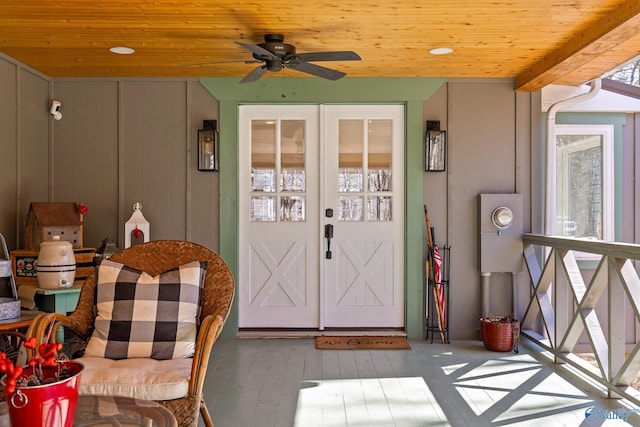 entrance to property featuring ceiling fan