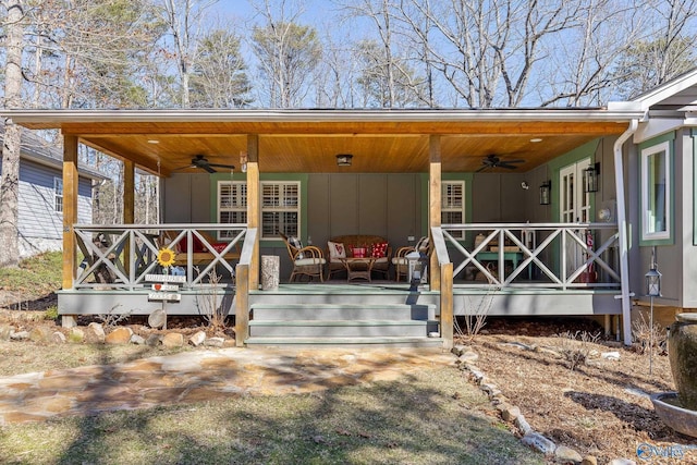 exterior space with a porch and a ceiling fan