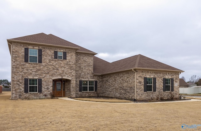 view of front of home featuring a front yard