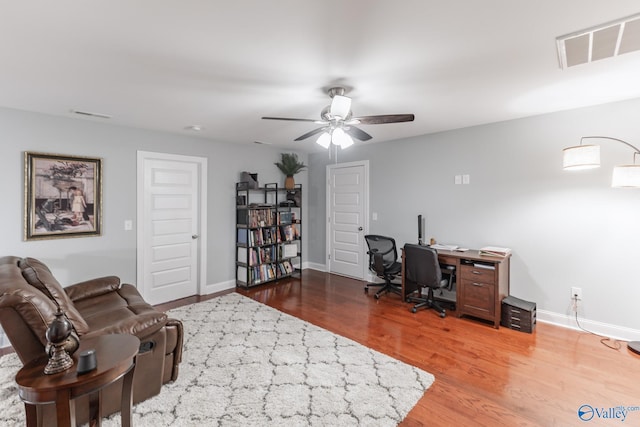 office featuring ceiling fan and hardwood / wood-style flooring