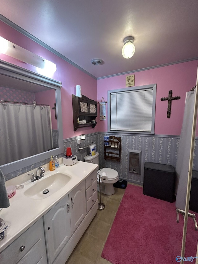 bathroom featuring heating unit, tile patterned flooring, vanity, toilet, and a shower with curtain