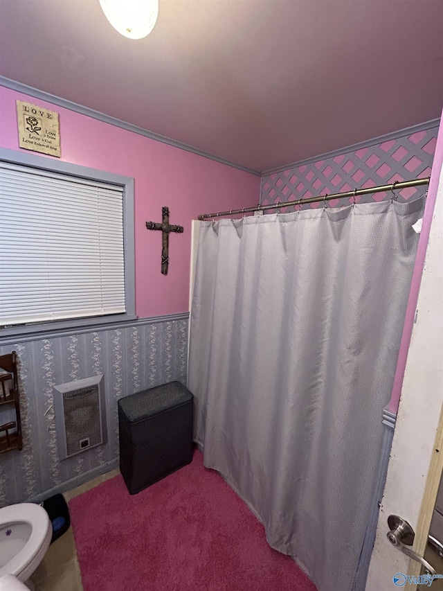 bathroom featuring heating unit