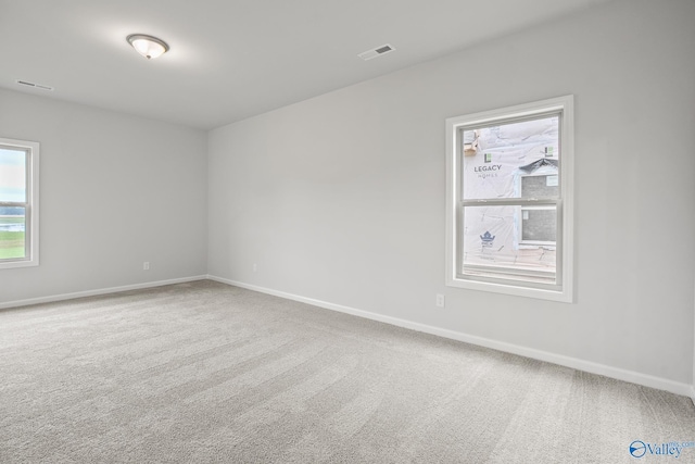 view of carpeted spare room